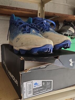 Under Armour Cream and Blue Athletic Cleats